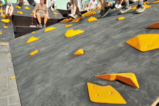 Creative and funny slab style climb with good foot holds during Lowlands festival