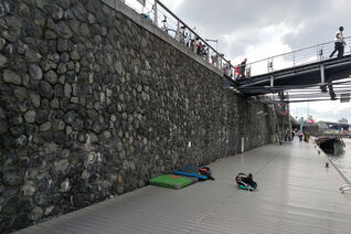 Getting ready for some urban bouldering on a quay wall at Piet Heinkade in Amsterdam